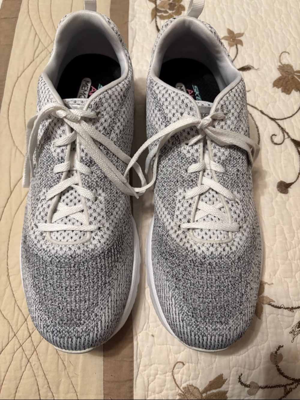 Skechers women’s Gray and White Knit Athletic Sneakers